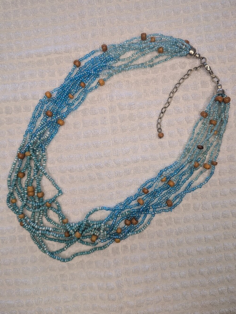 Multi Strand Sea Bead Necklace With Wood Accent Beads